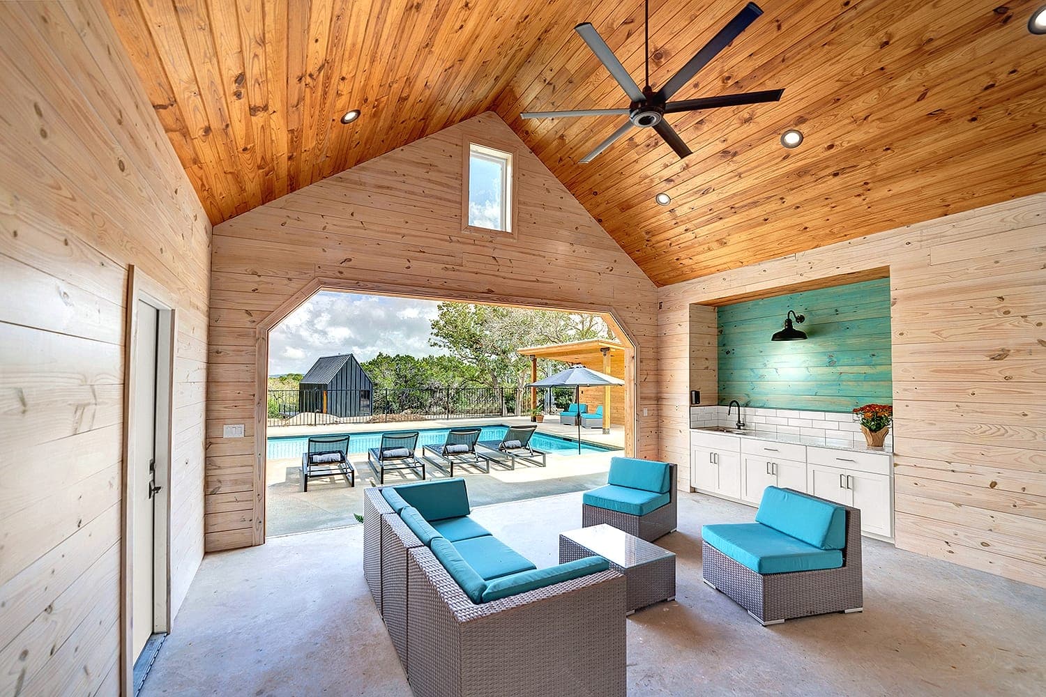 Covered pavilion with lounge seating and wood ceiling at Wayside Wimberley