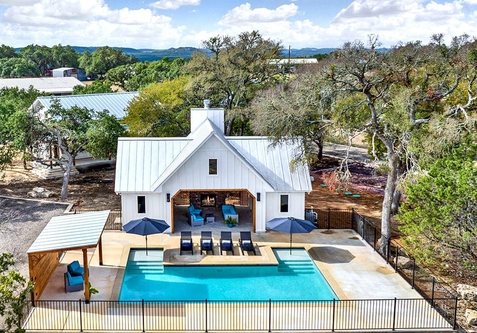 Wayside Wimberley clubhouse and pool area with hill country views