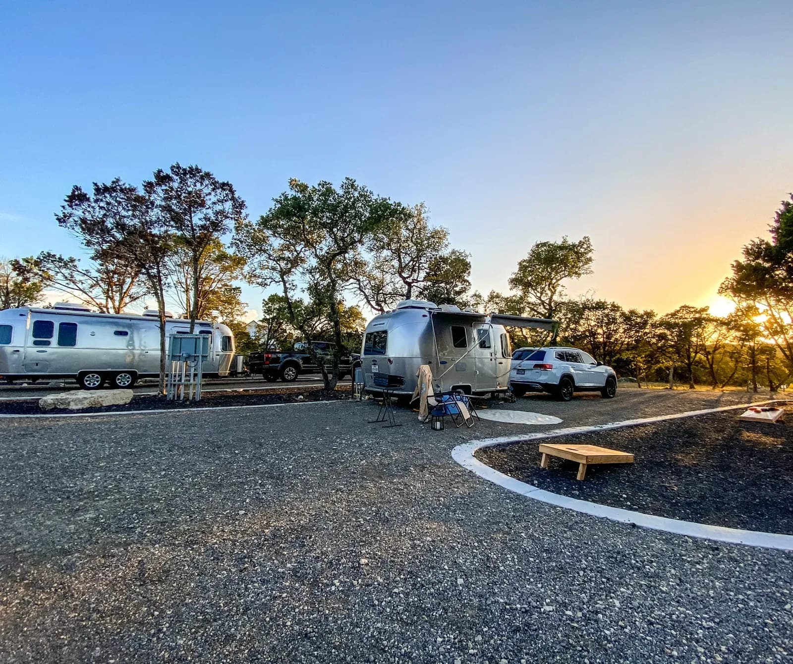 RV site at sunset with Airstream at Wayside Wimberley