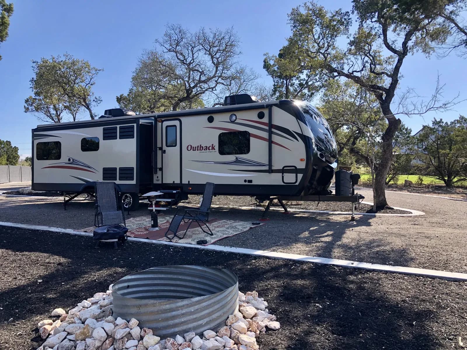 Fifth-wheel RV parked at a premium site at Wayside Wimberley