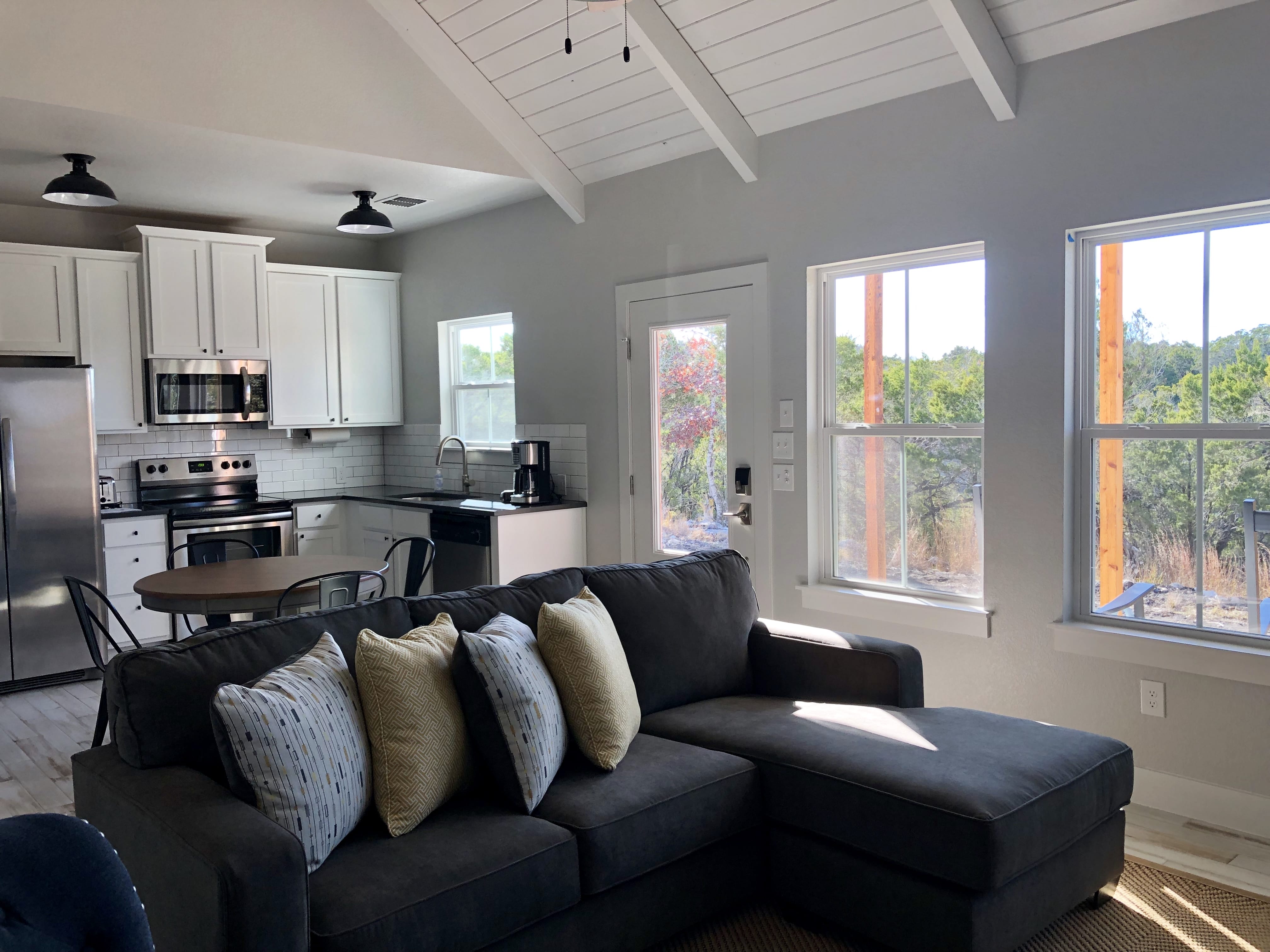 Living room with hill country views inside Summermoon Cottage