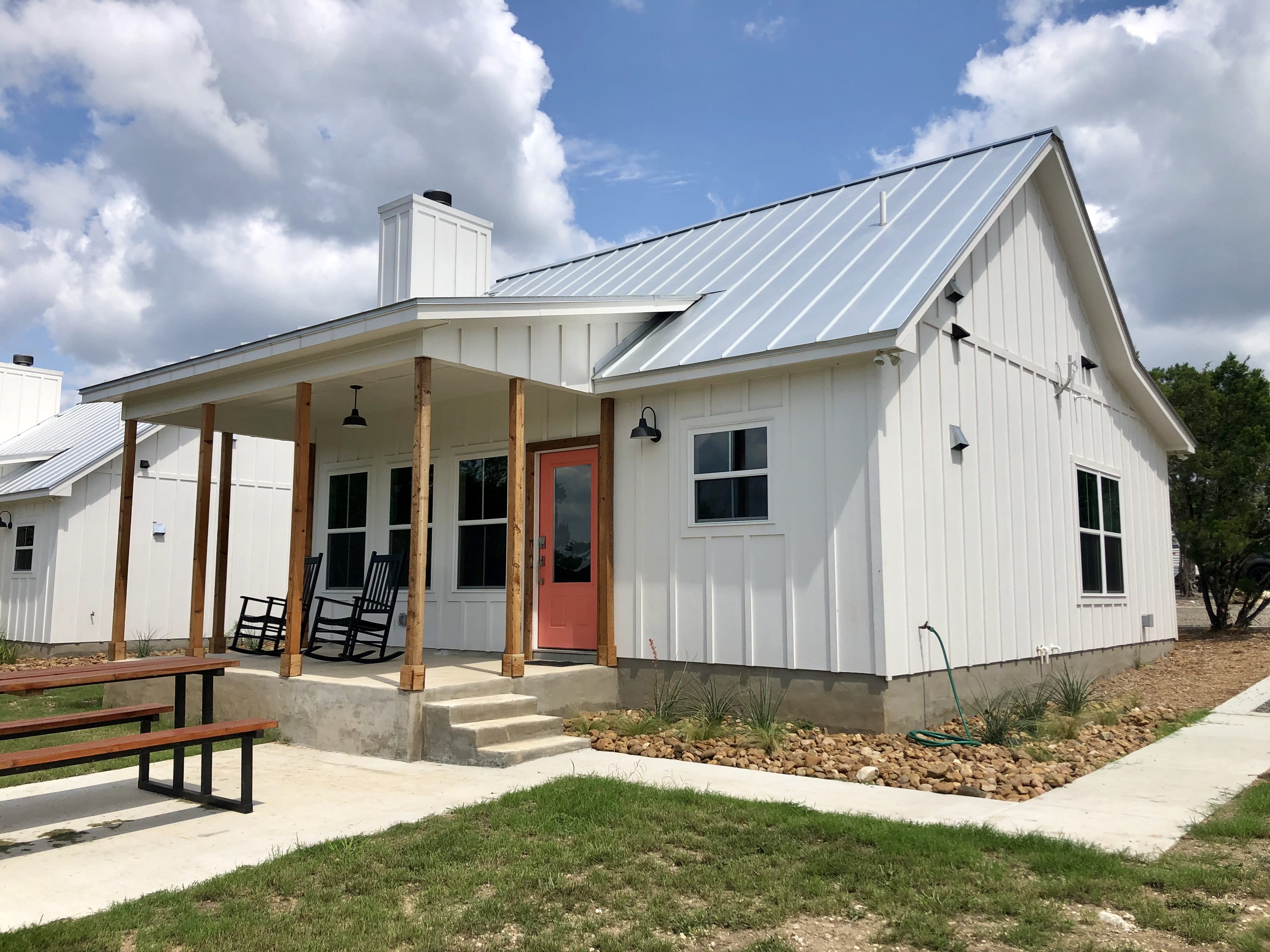 Summermoon Cottage exterior with patio at Wayside Wimberley